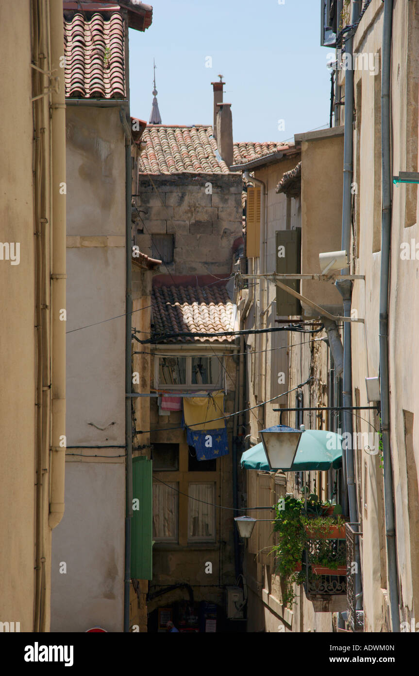 A view down one of the many old streets in Sommieres in the Gard Languedoc Roussillon. The South of France. Stock Photo