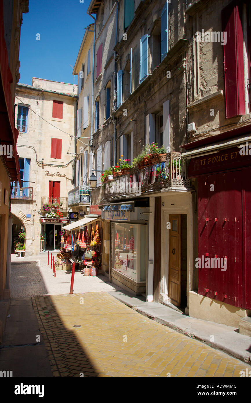 A view down one of the many old streets in Sommieres in the Gard Languedoc Roussillon. The South of France. Stock Photo