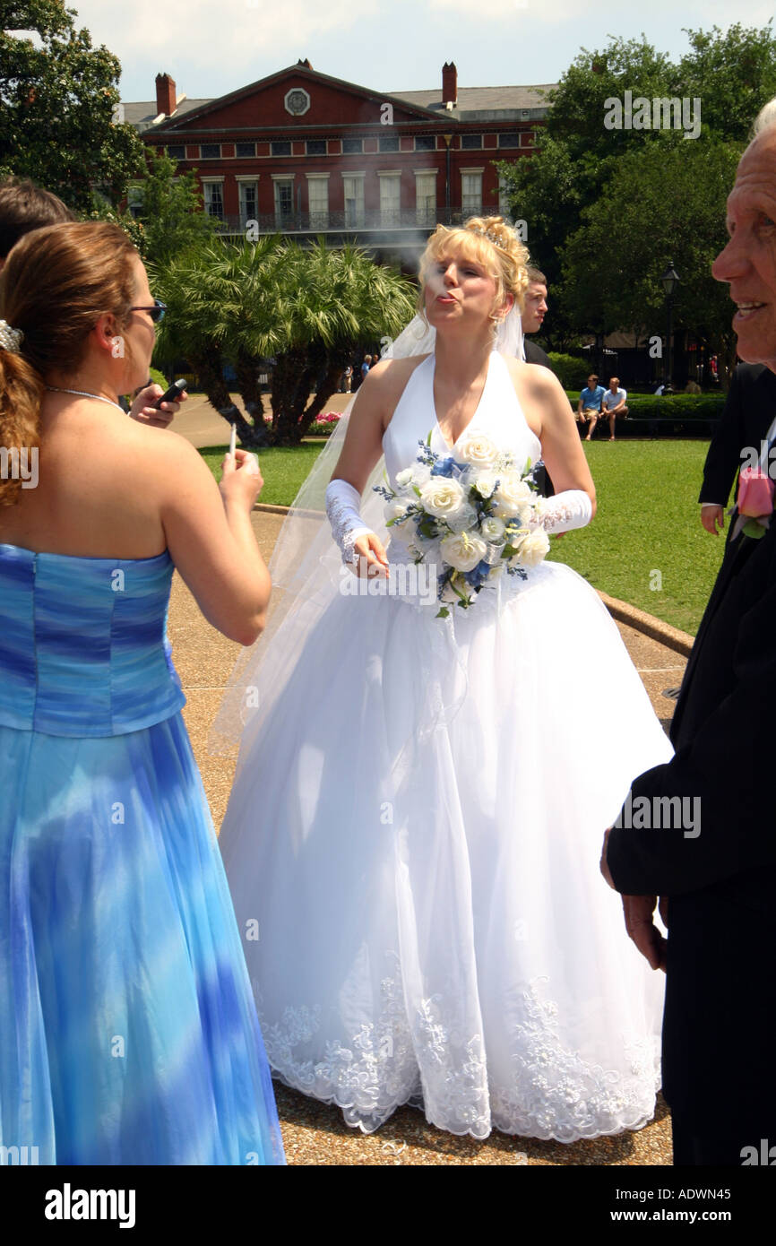 wedding bride smoking cigarette Nervous bride smokes her last cigarette before the wedding Stock Photo