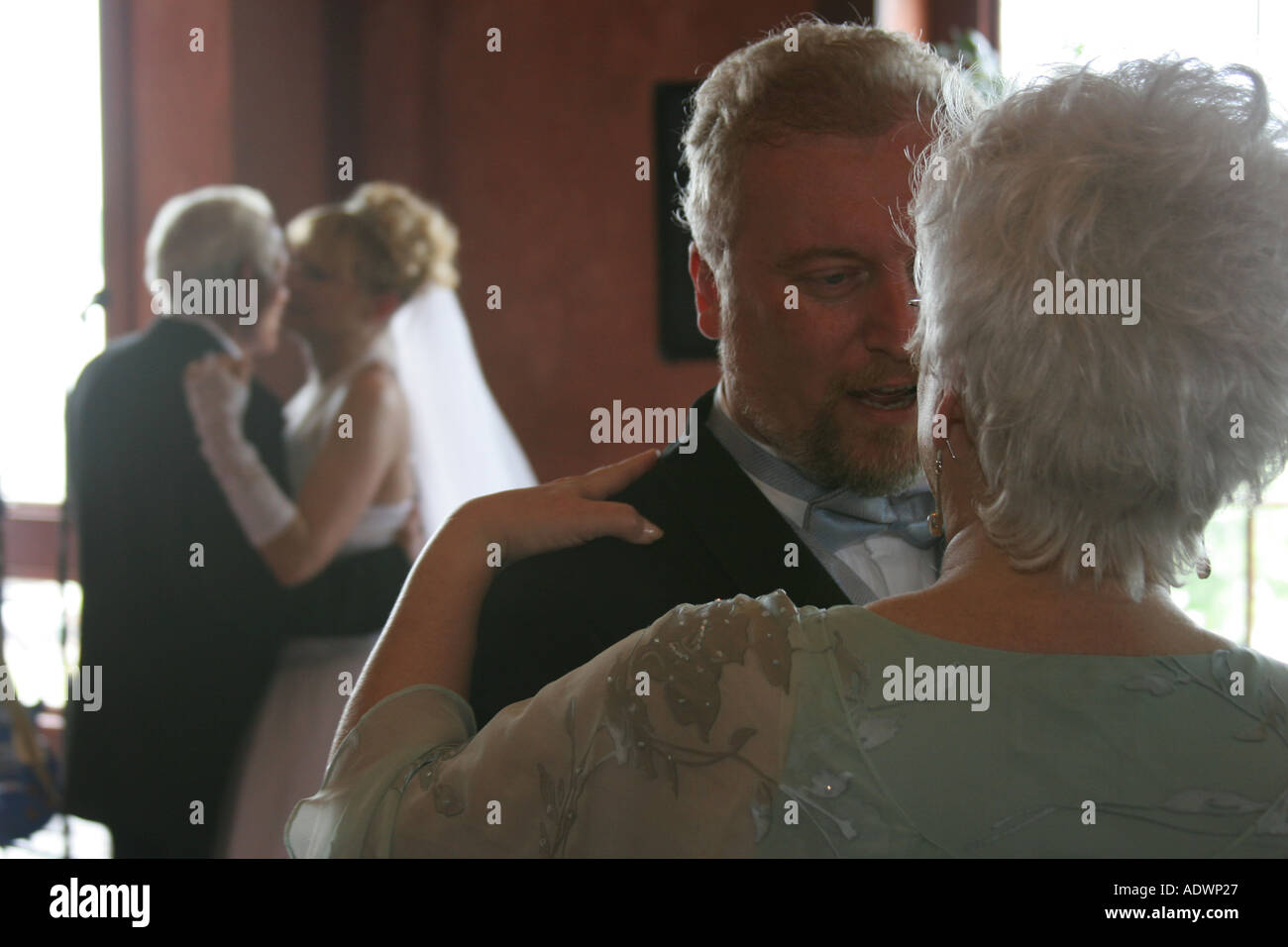 A Groom Dances With His Mother While His Bride Dances With Her Father