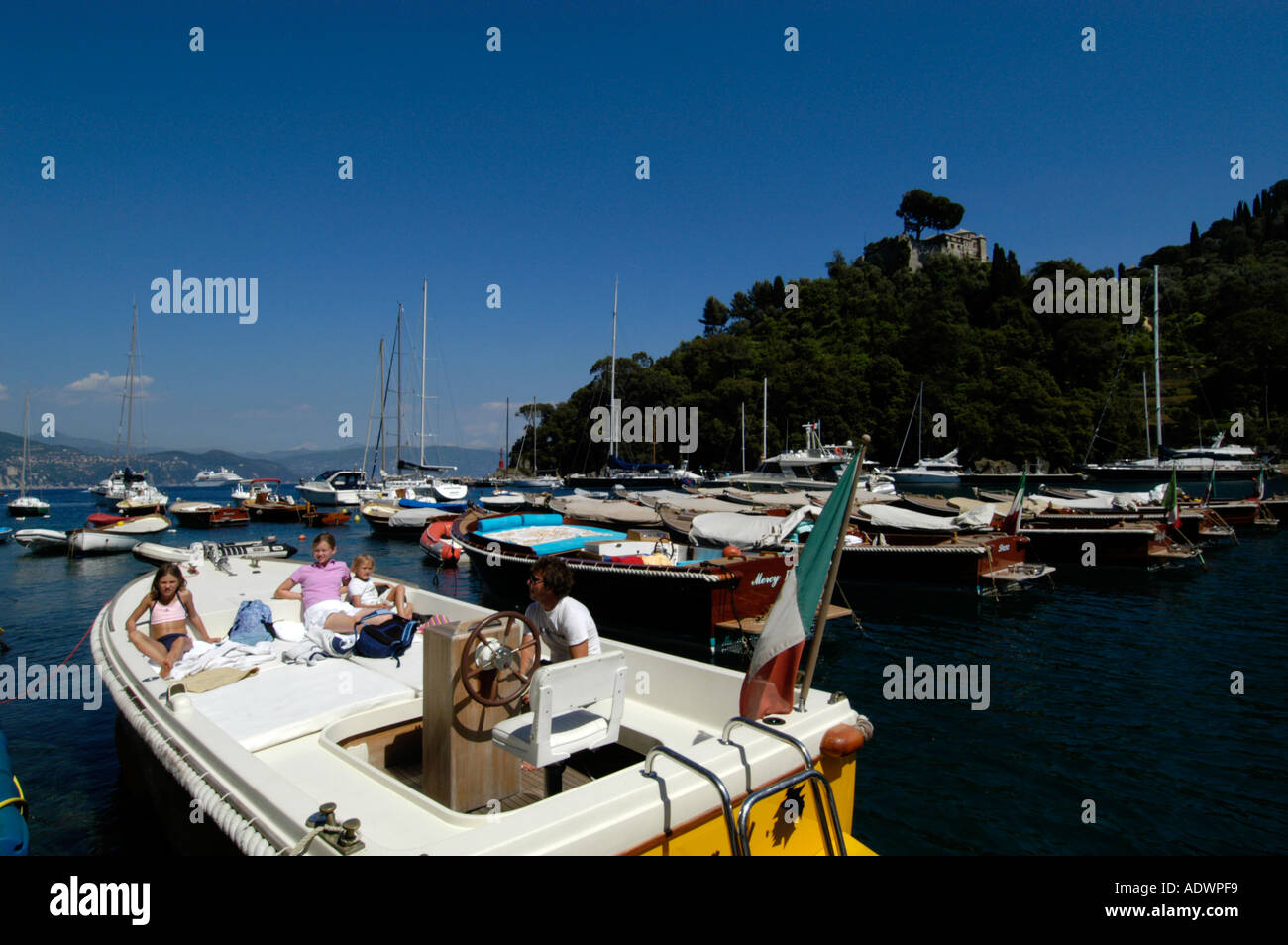 Family boat holiday in Portofino Italy Stock Photo