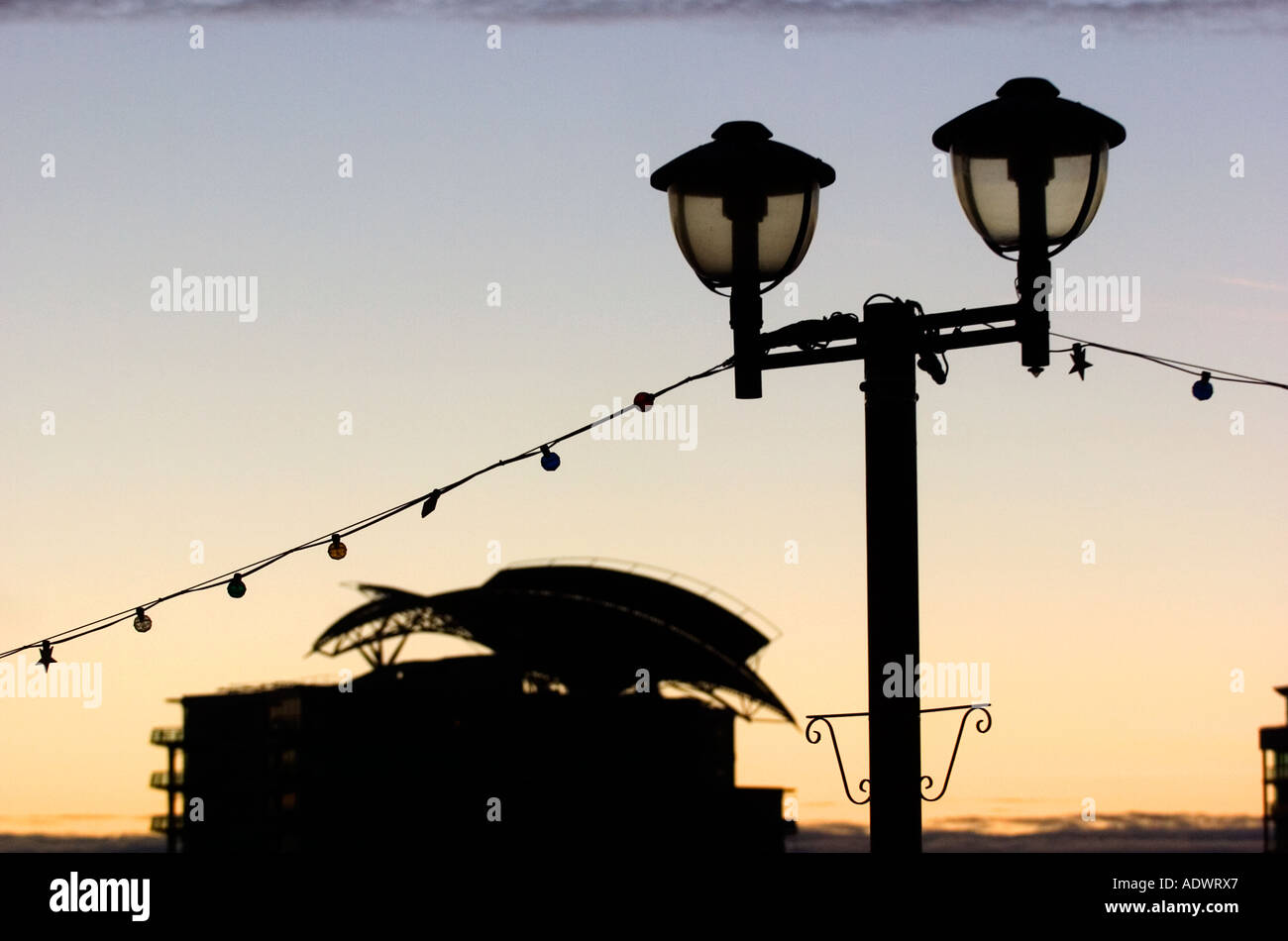 Street lighting in Cardiff Bay with the St David's hotel in the