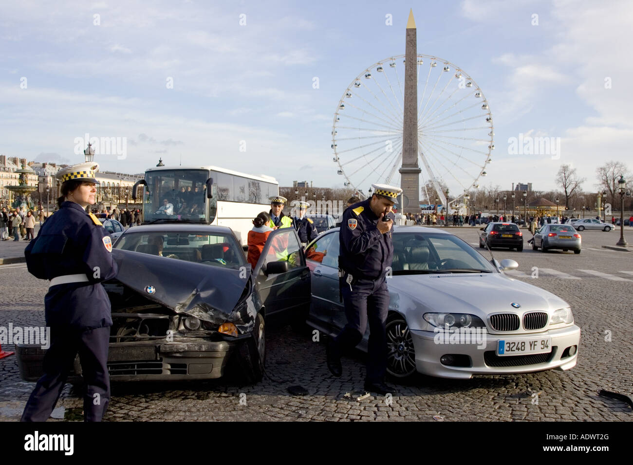 Traffic police investigate car accident between two BMW cars in Place de la Concorde Central Paris France Stock Photo