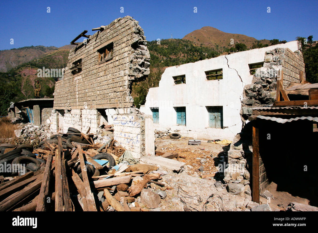 Buildings demolished in earthquake area of Azad Jammu Kashmir in village of Pattika Pakistan Stock Photo