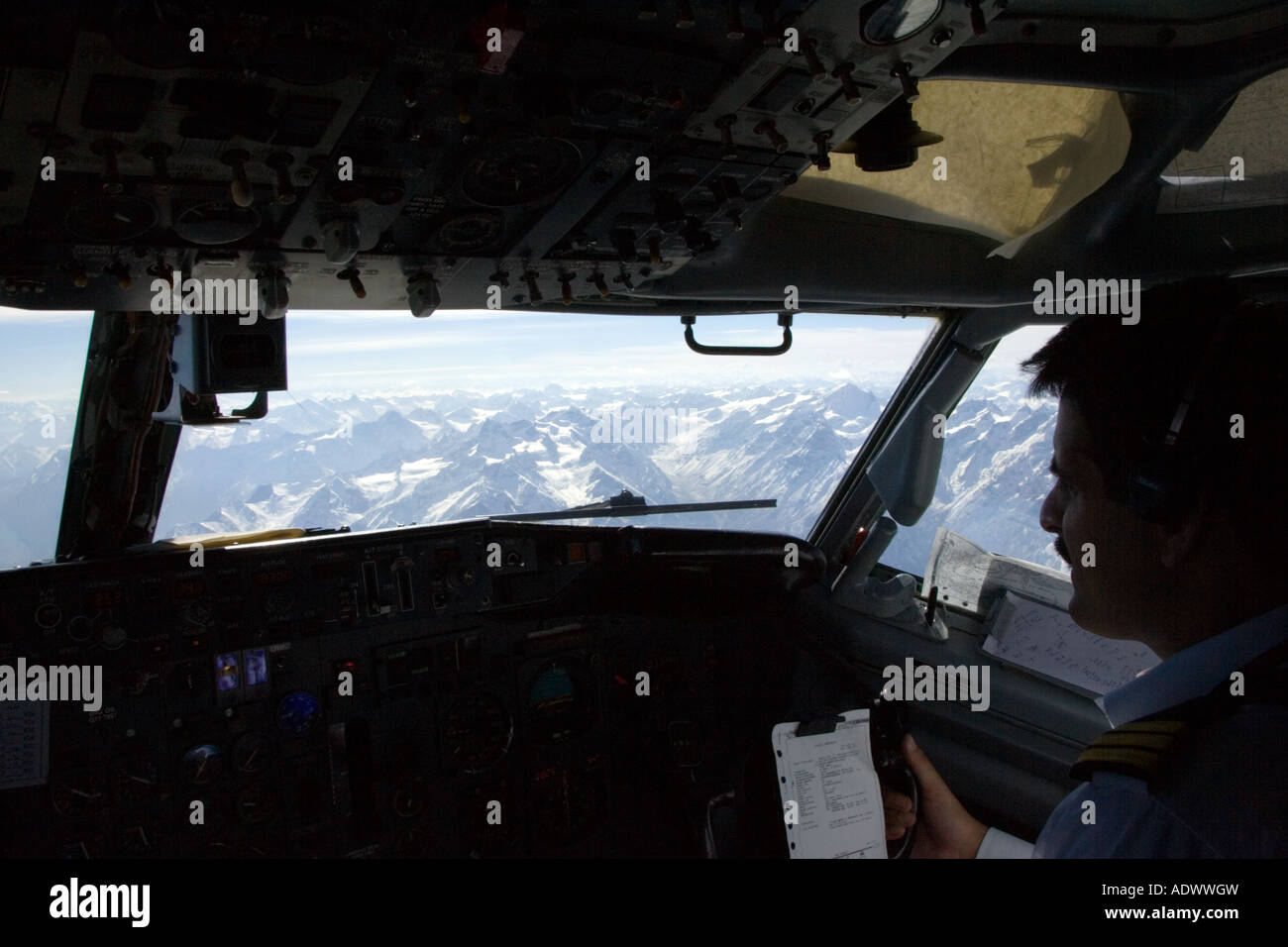 Peaks of Karokoram Mountains from 737 jet aircraft cockpit approaching Skardu Valley North Pakistan Stock Photo