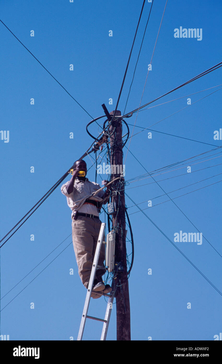 Man fixing electricity in Hargeisa, Somaliland Stock Photo - Alamy