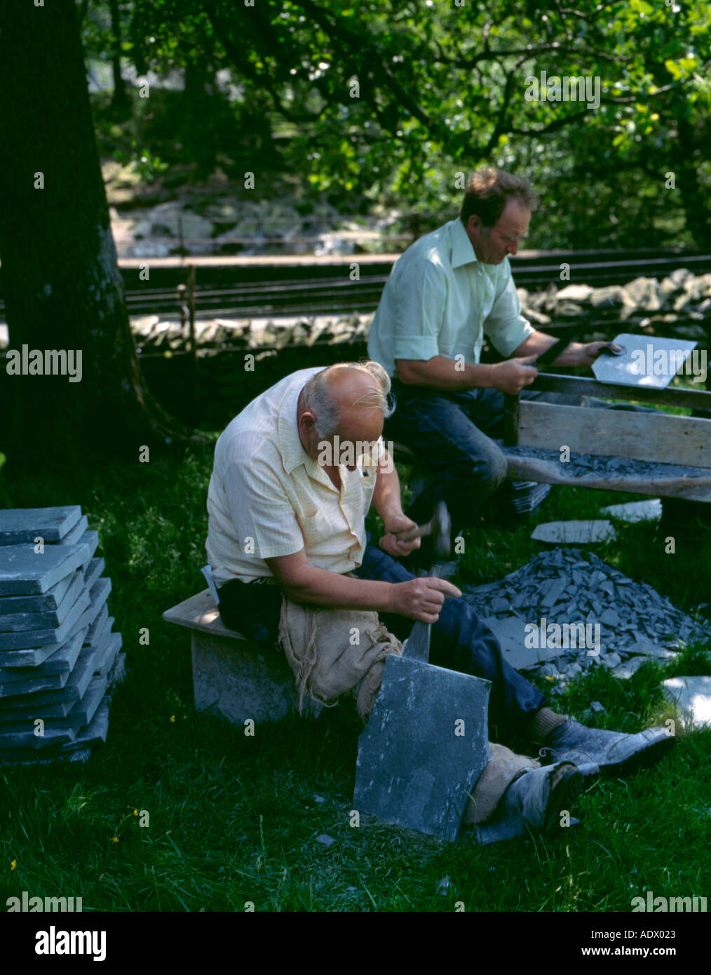 Slate cutters at work, Lake District National Park, Cumbria, England, UK. Stock Photo