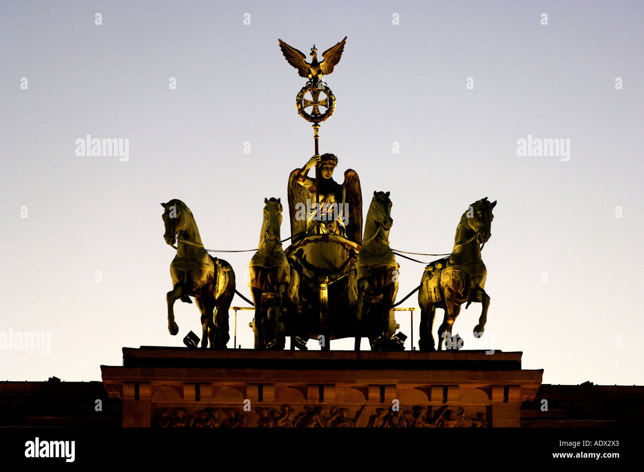 Berlin the sculpture of Victory in her four horse chariot on top of the Brandenburger Tor Stock Photo