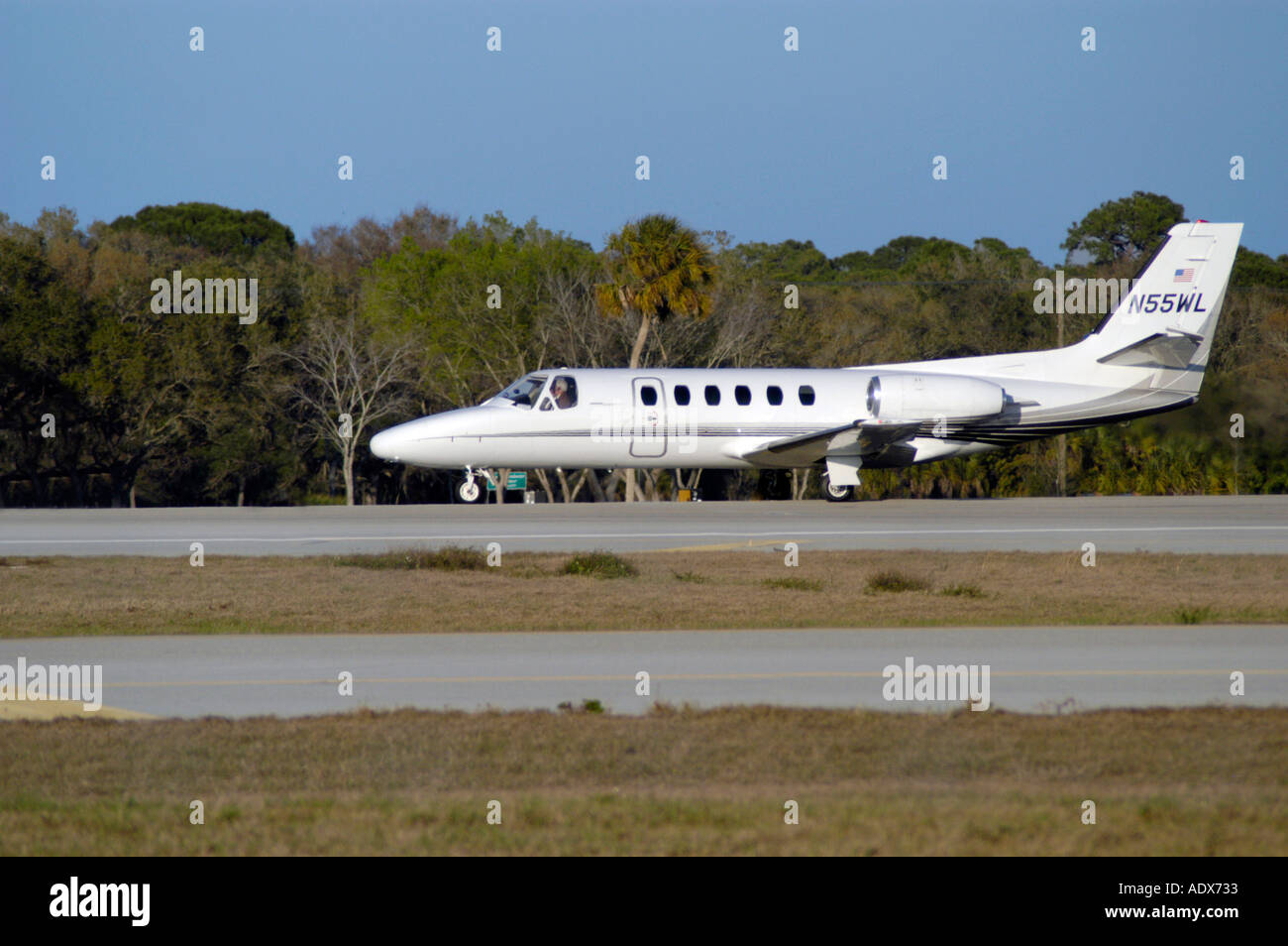 Airplane in the air Cessna Citation Stock Photo