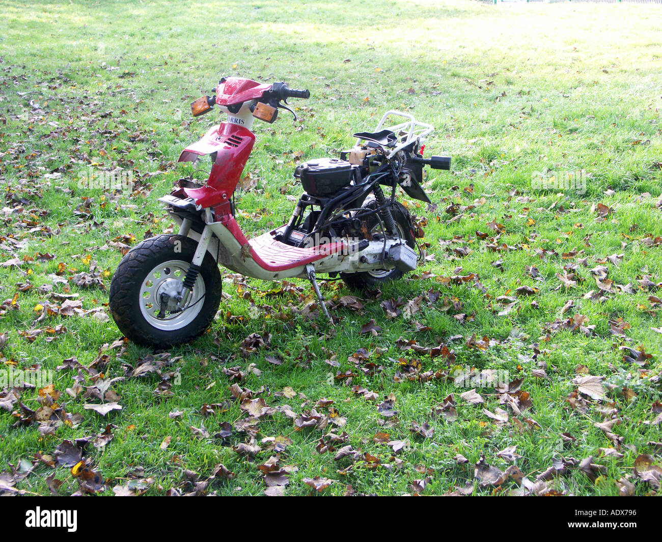 Stolen Scooter abandoned on parkland Tamworth Stock Photo - Alamy