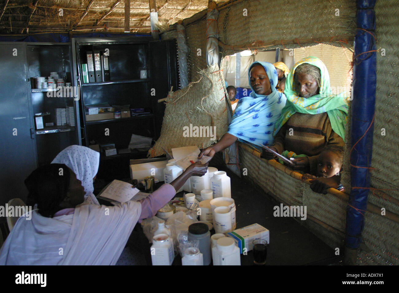Sick people getting drugs at the MSF clinic in Kalma camp Nyala town Darfur Stock Photo