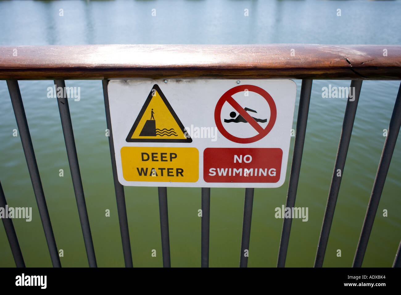 Deep water no swimming signs on riverside Stock Photo