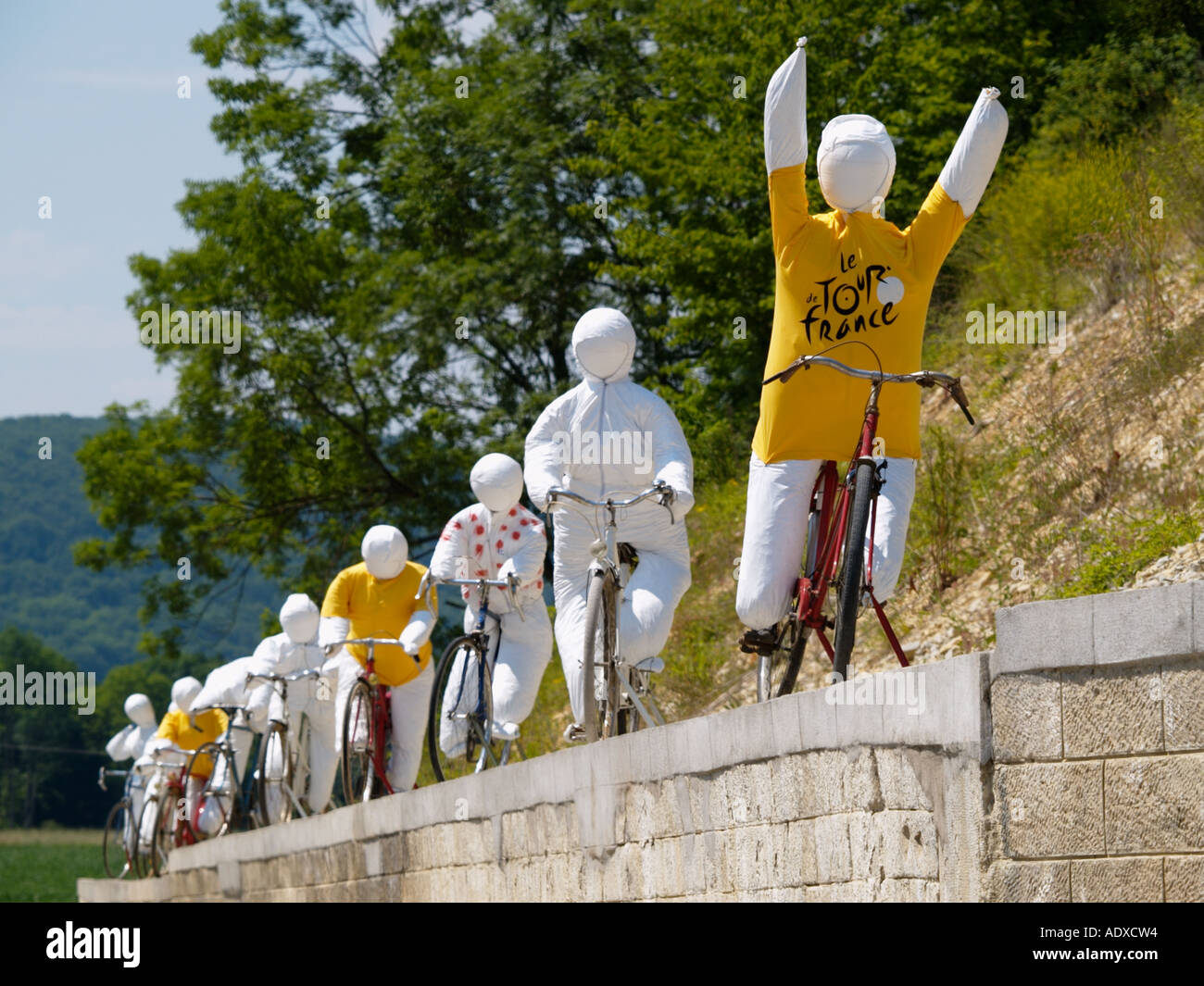 Roadside peloton of cycling dummies celebrating the passing of the Tour de France 7th stage 2005 season Suzannecourt France Stock Photo