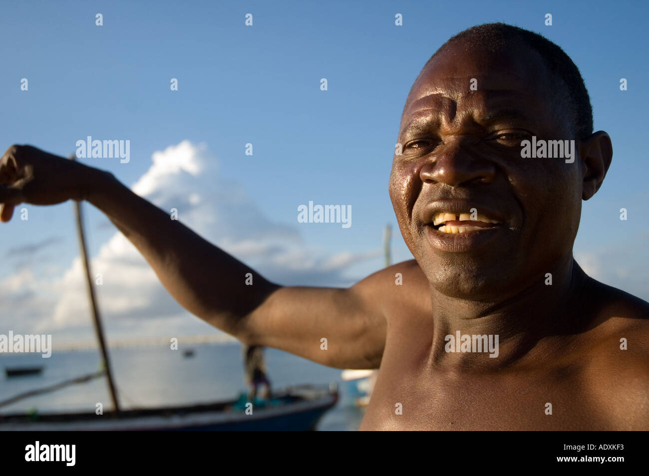 African fisherman early morning talking about his work on the Ilha de ...
