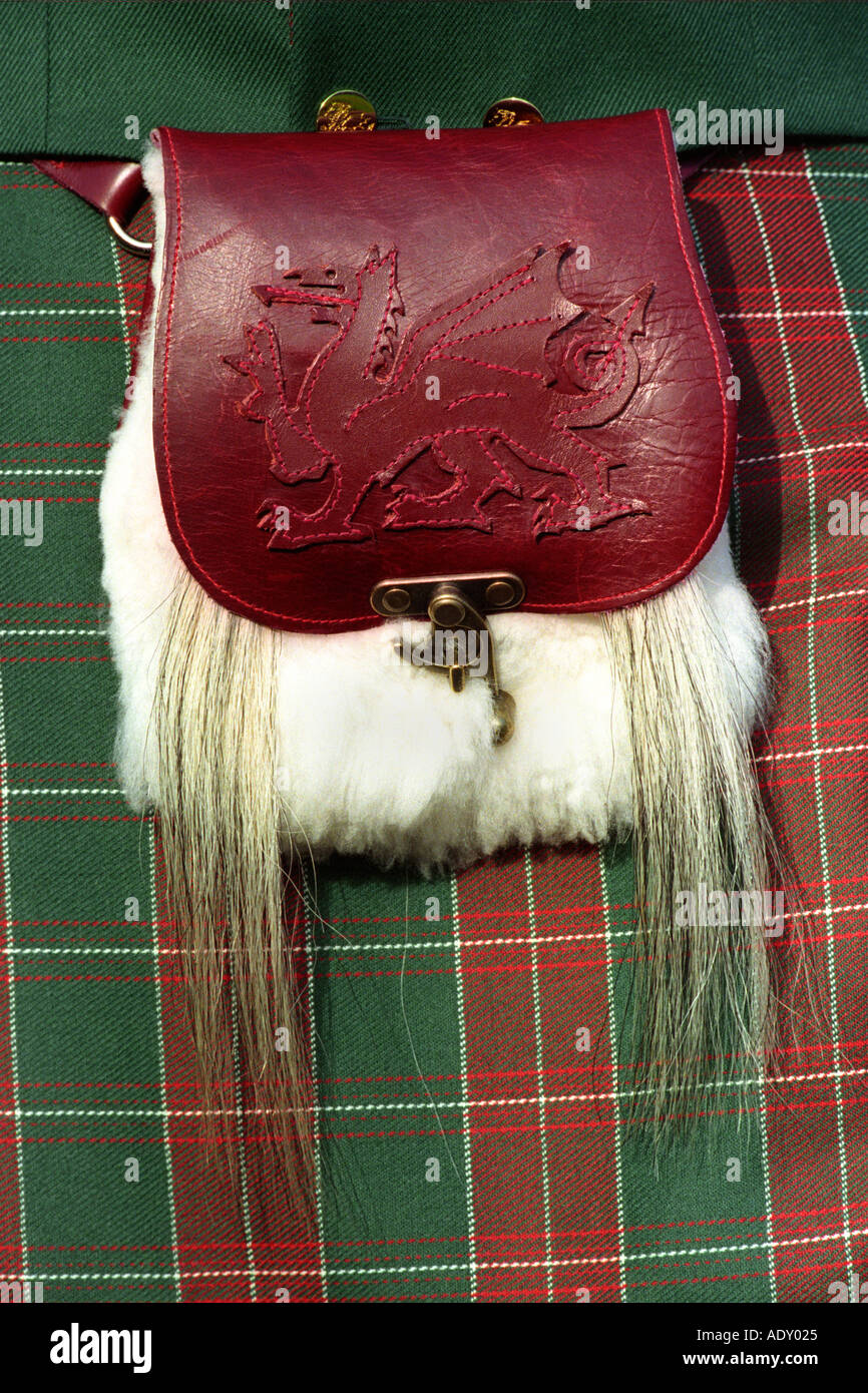 Man wearing Welsh kilt in St David's tartan with red dragon leather pouch at Cardiff Castle Wales UK Stock Photo