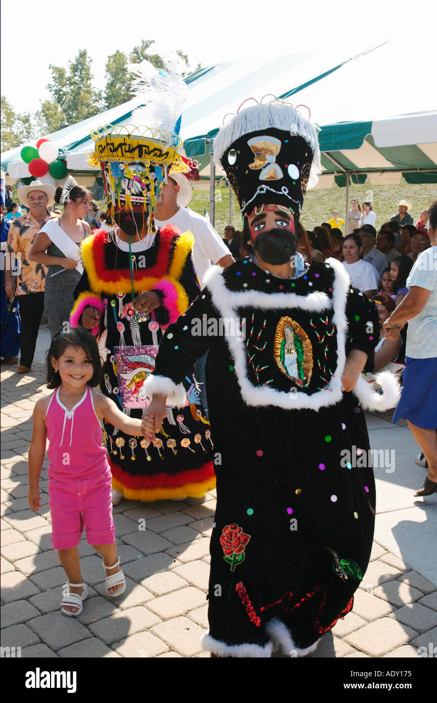 EVENTS Waukegan Illinois Parade of Kings in costume young girl hold