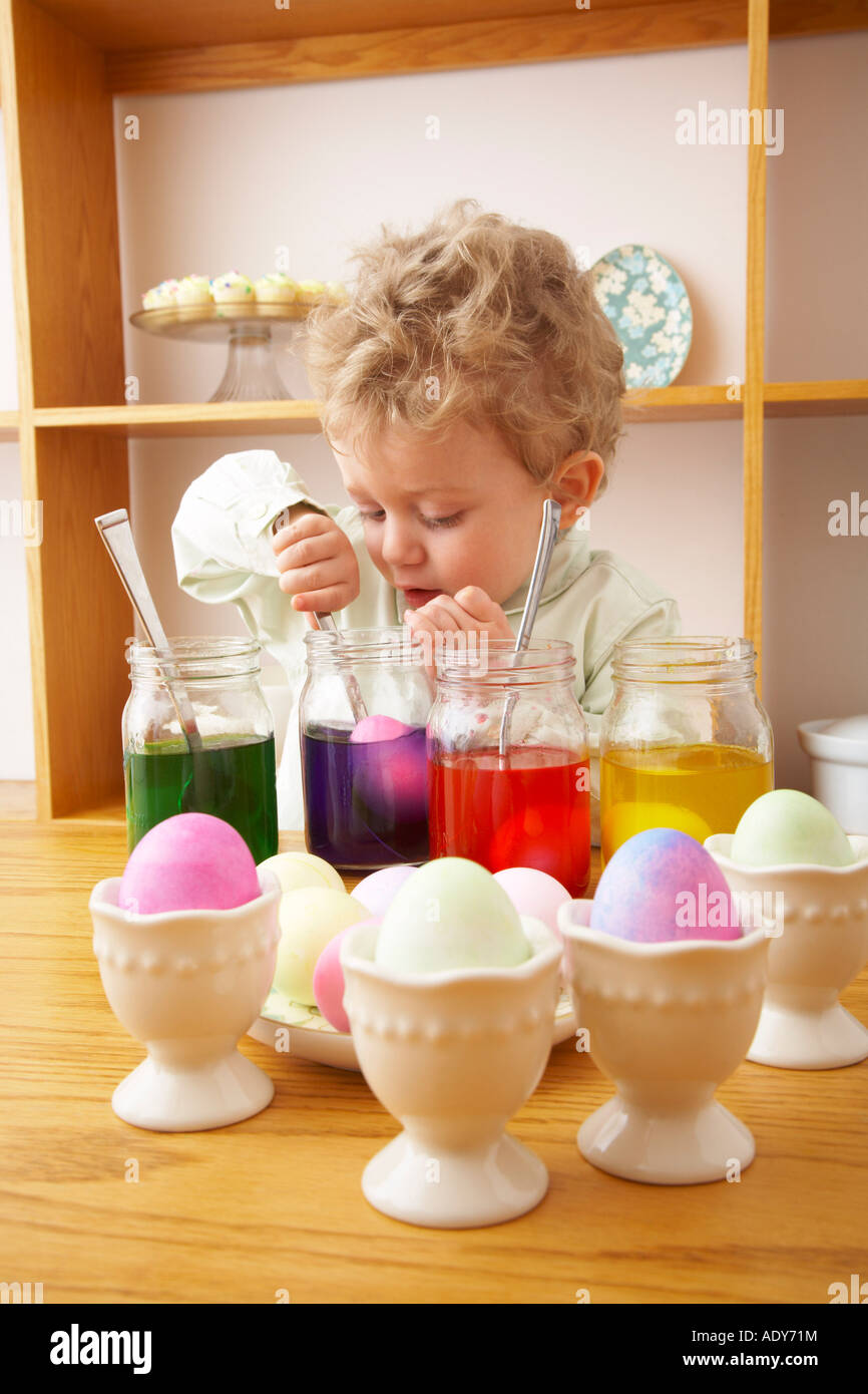 Child Making Easter Eggs Stock Photo - Alamy