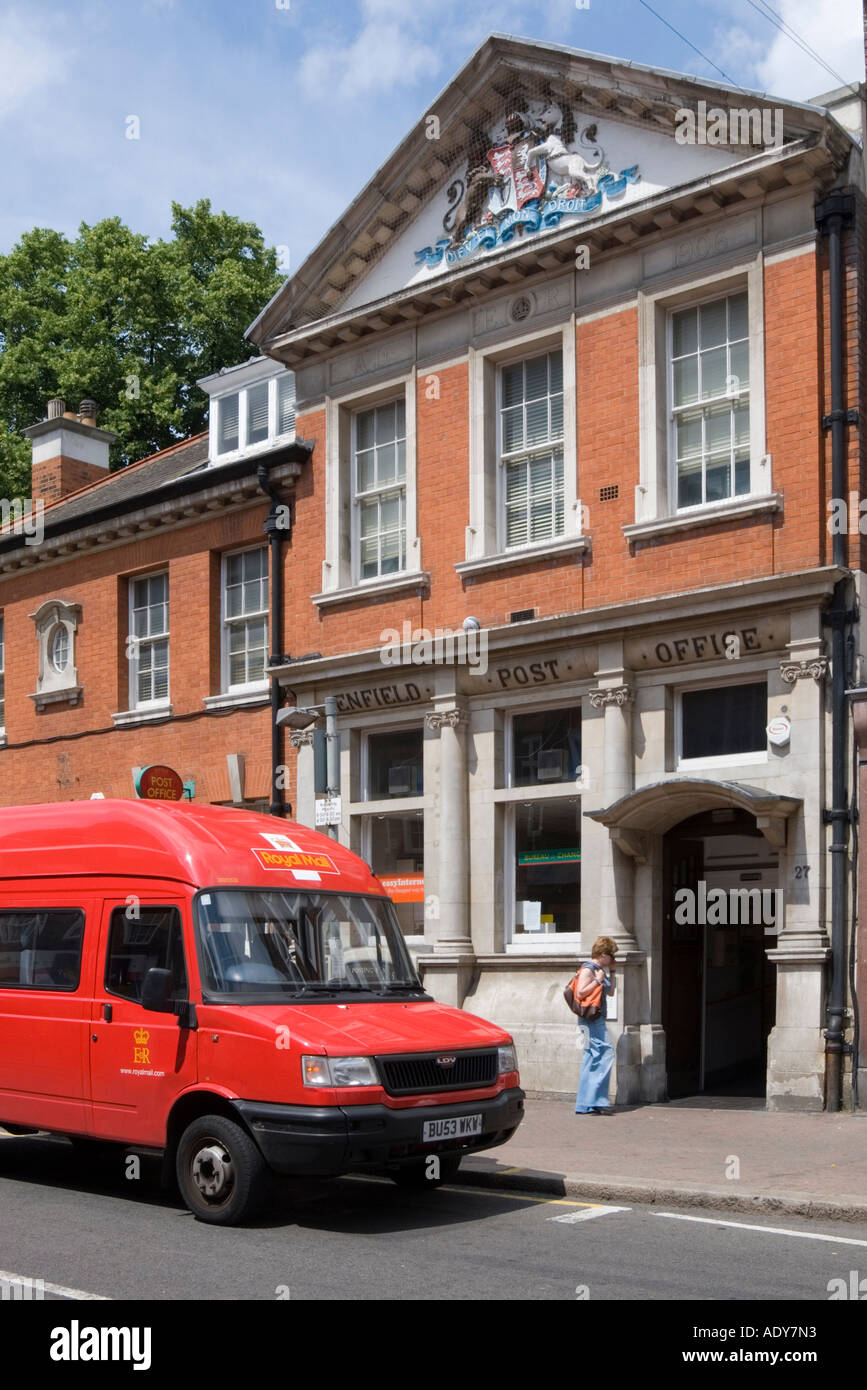 Customer going into main post office in Enfield North London Stock