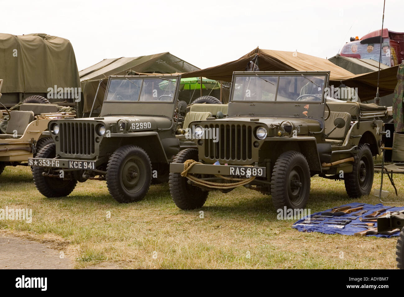 two WWII Jeep vehicles on display at Rougham fair in Suffolk 2006, UK Stock Photo