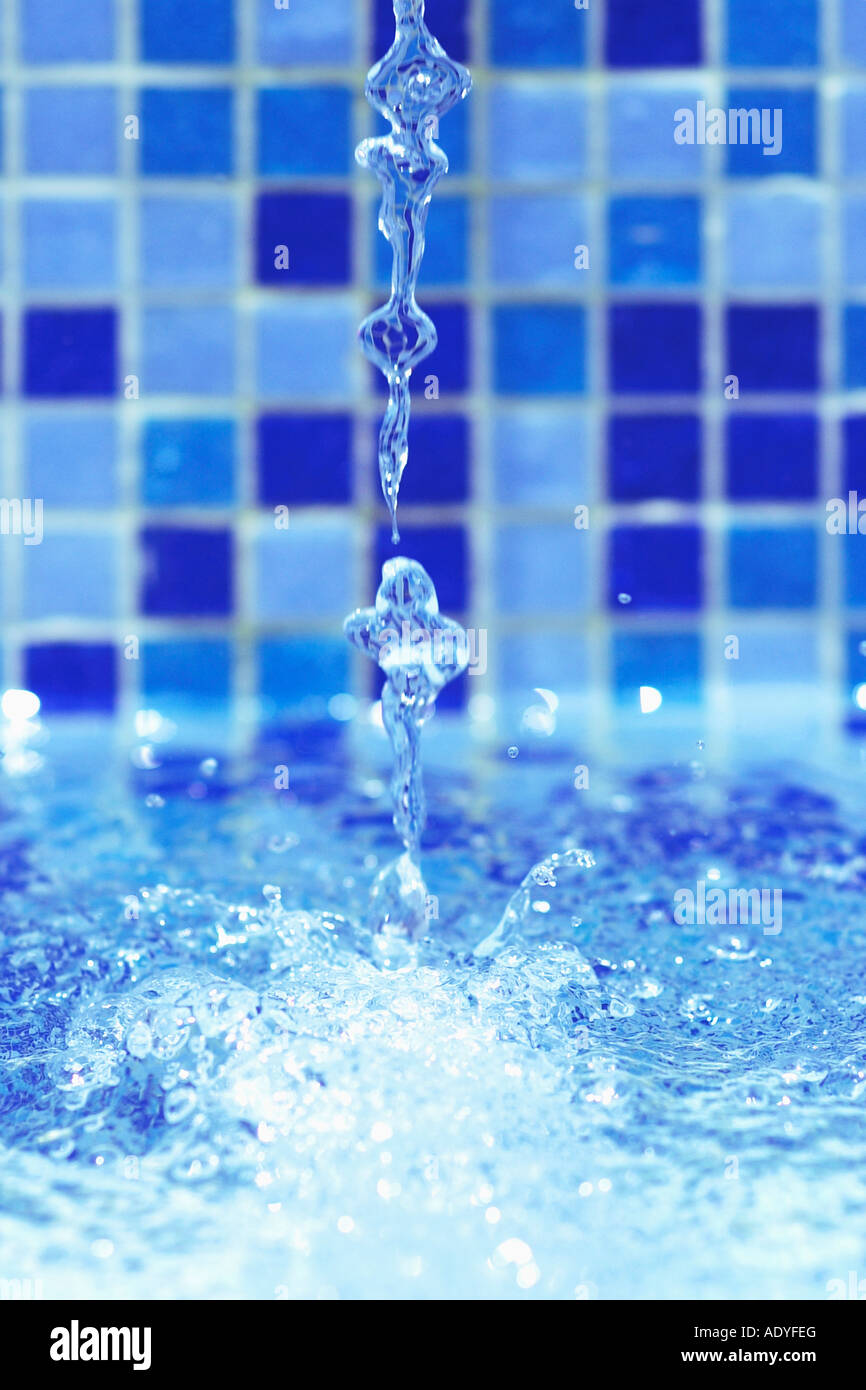 Water pouring into a pool Stock Photo Alamy