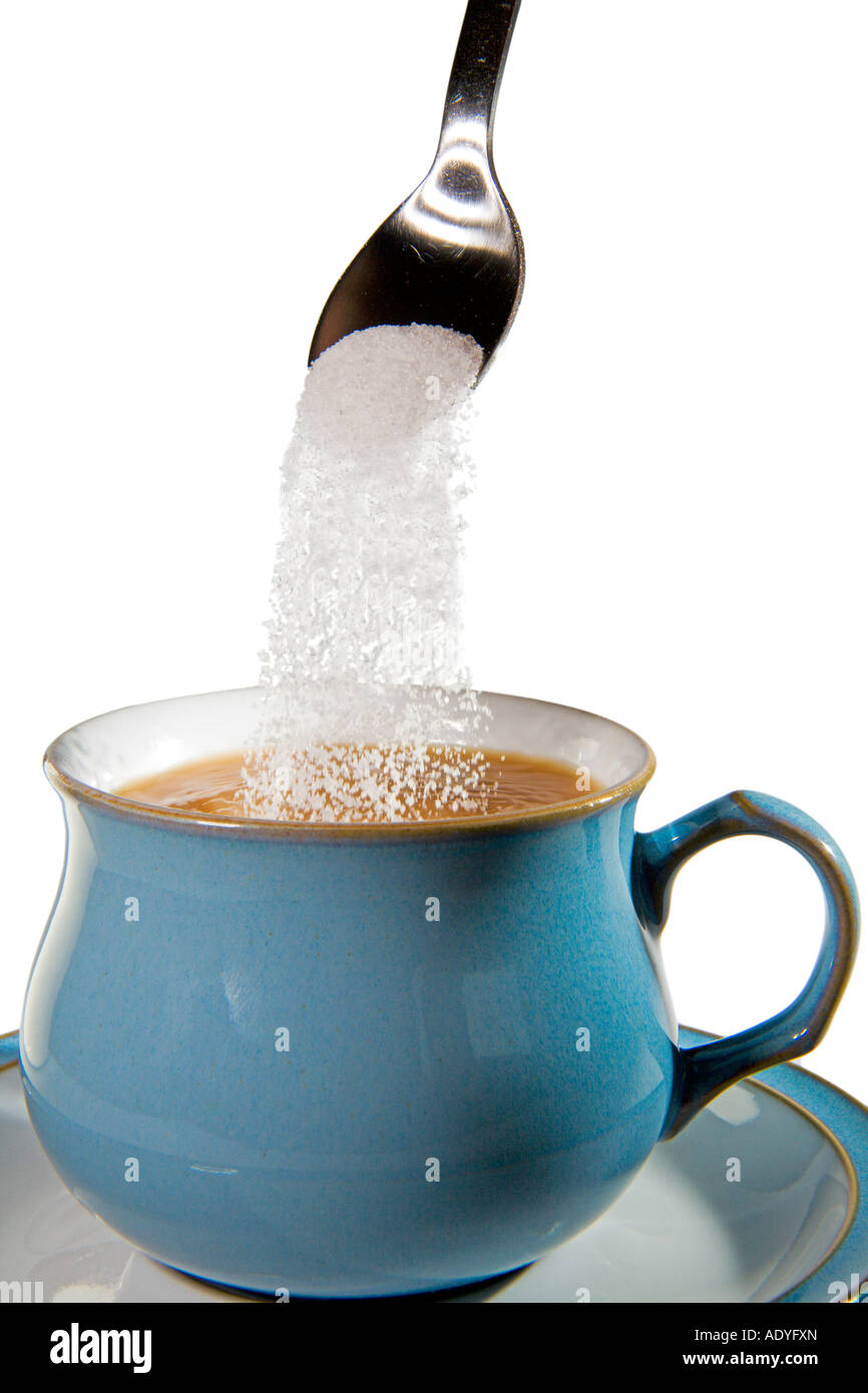 Pouring sugar from silver spoon into cup of hot English tea on saucer Stock  Photo - Alamy, image size:866x1390