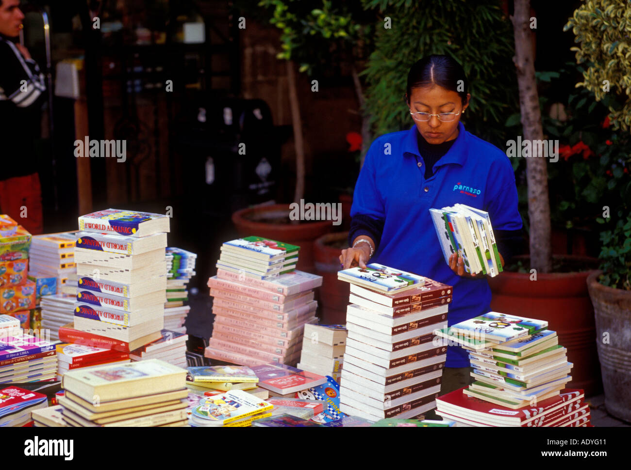 1, one, Mexican woman, employee, worker, bookstore, bookshop, el parnaso, Centenario Garden, Coyoacan, Mexico City, Federal District, Mexico Stock Photo