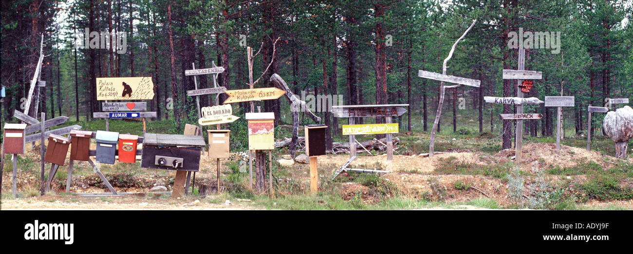 boards, signs and letterboxes, near an outside road into the forest, Finland, Lapin, Aug 03. Stock Photo