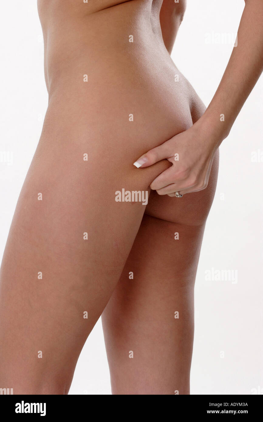 woman touching her bottom, testing cellulite. Stock Photo