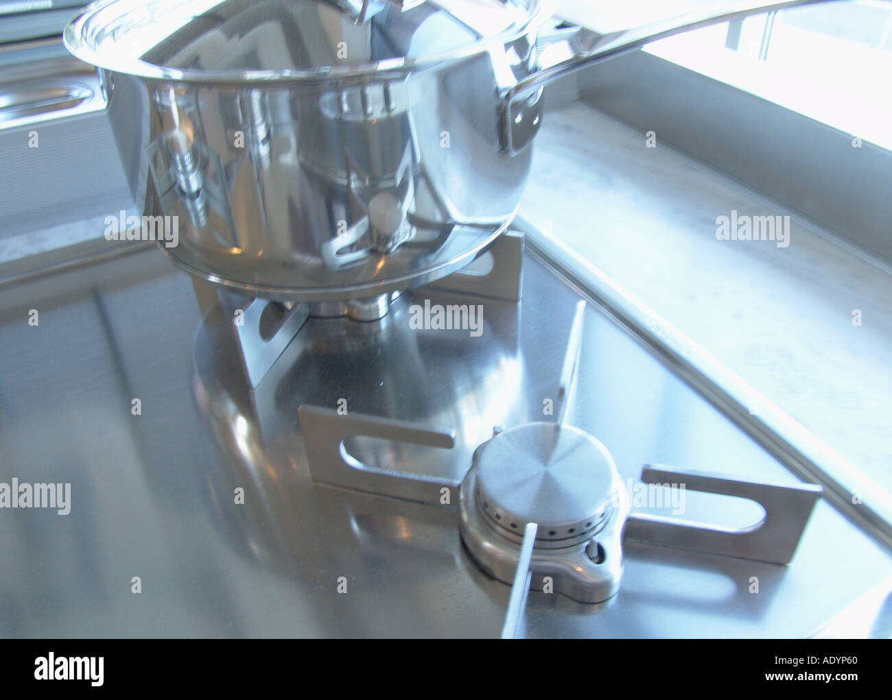 stainless cookware on modern gas burner Stock Photo Alamy