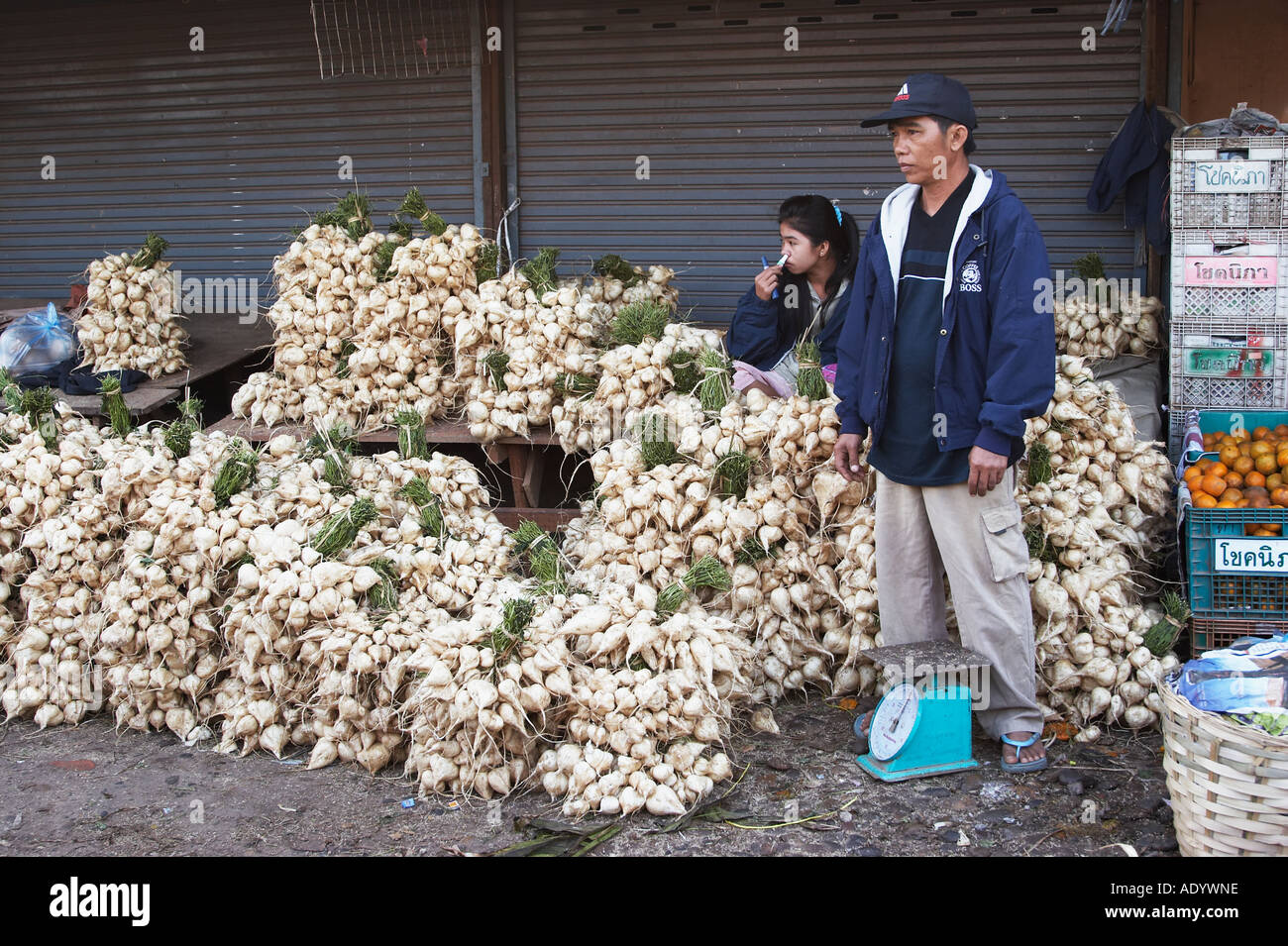 Man Sellng Turnips At Market Stock Photo Alamy