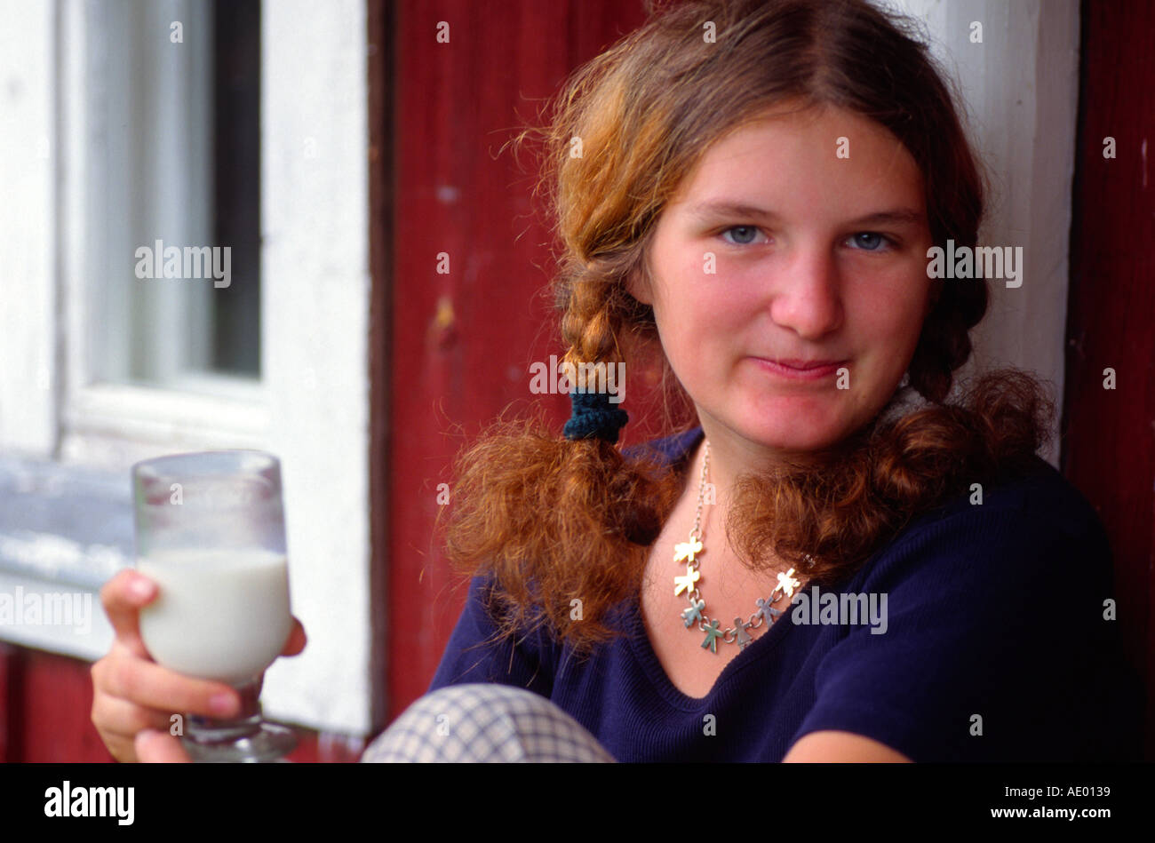 Finnisches Maedchen finnish girl with a glas of milk MR Stock Photo