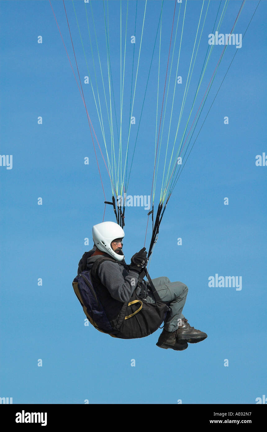 Paraglider in blue sky Stock Photo