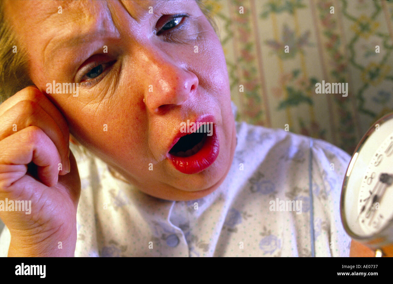 Morgenmuffel Frau ist frueh geweckt MR tired woman in the early morning Stock Photo