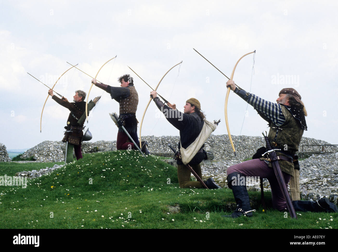 Medieval archers bowman bow and arrow bowmen long bowsEngland, UK, re-enactment, history, English historical, archers, archery, Stock Photo