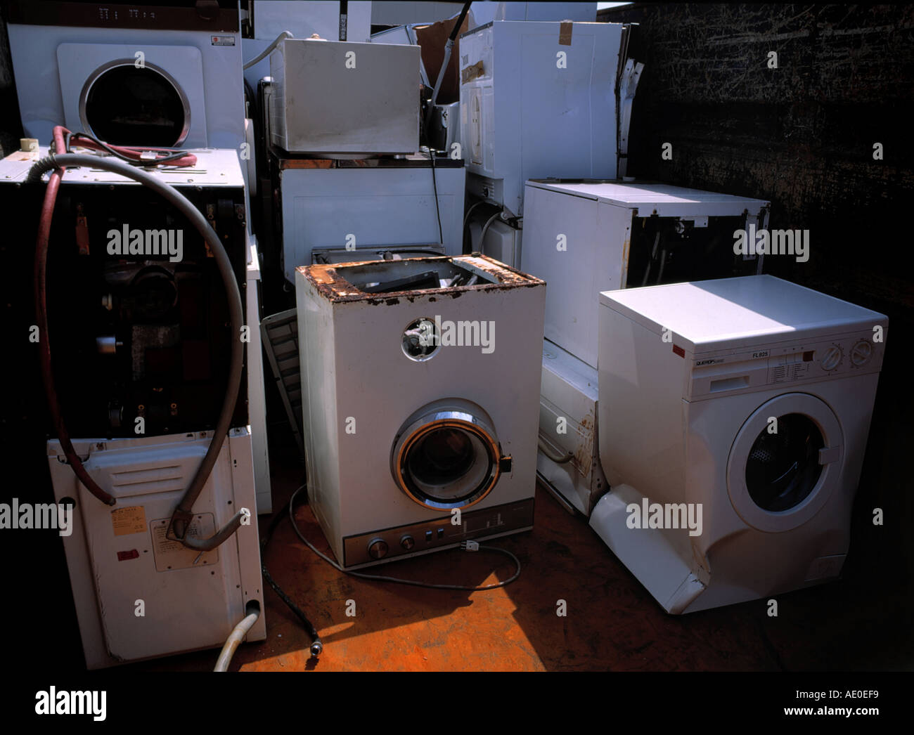 broken washing machines collected for recycling Stock Photo Alamy