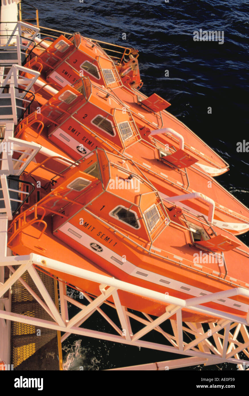 Free fall self righting lifeboats on an oil rig; 'Semi 1'. Stock Photo