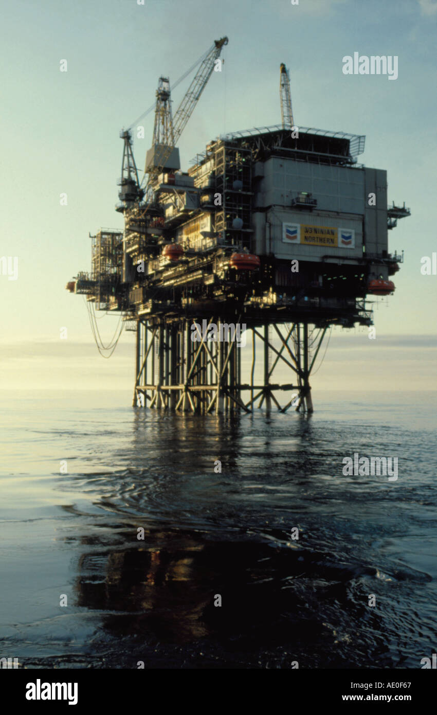 'Ninian Northern' North Sea oil platform seen over a calm sea. Stock Photo