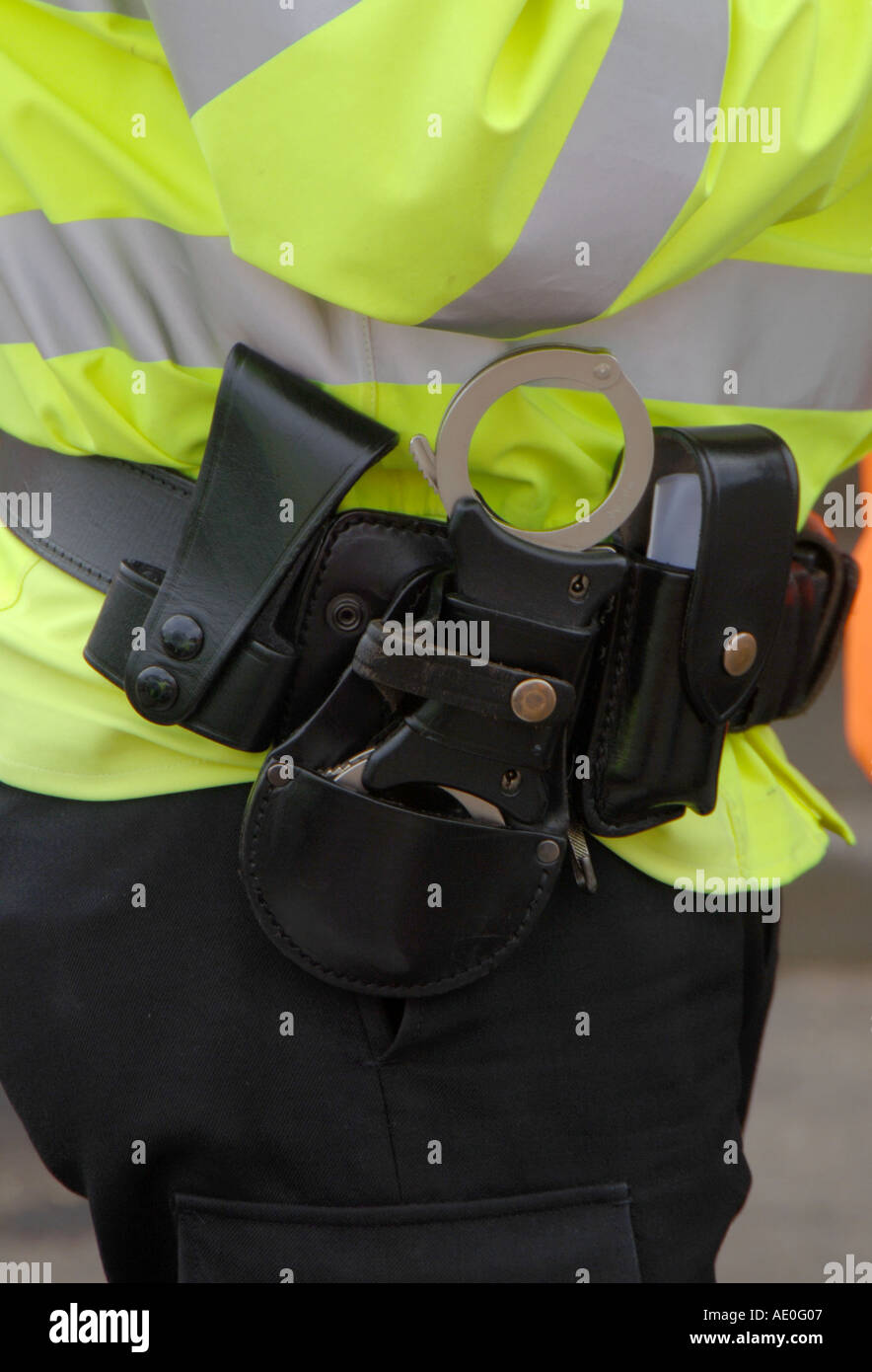 Police handcuffs and utility belt Stock Photo