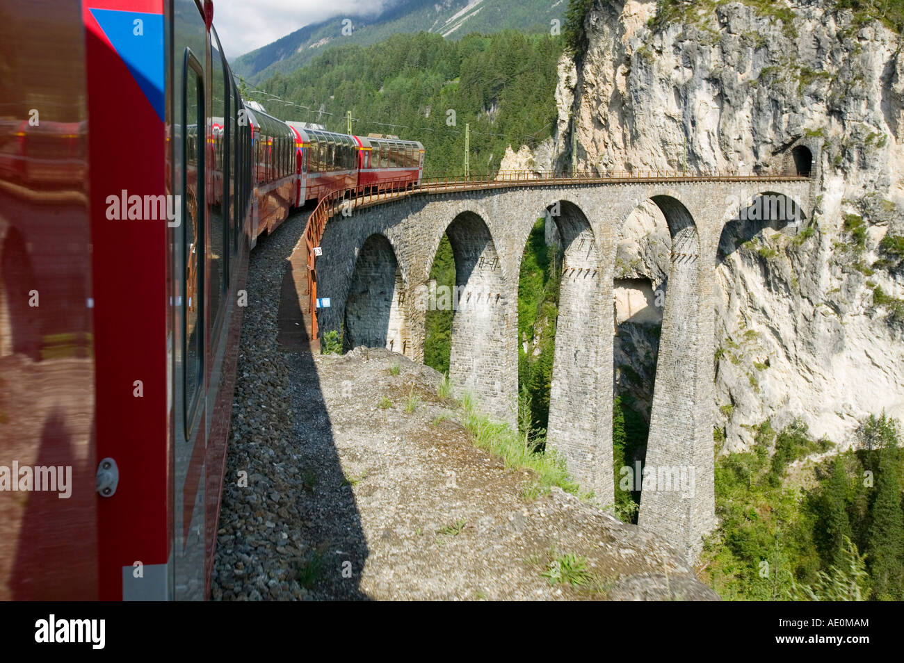 the Bernina Express train in Switzerland from Chur to Tirano in Italy crossing the world famous
