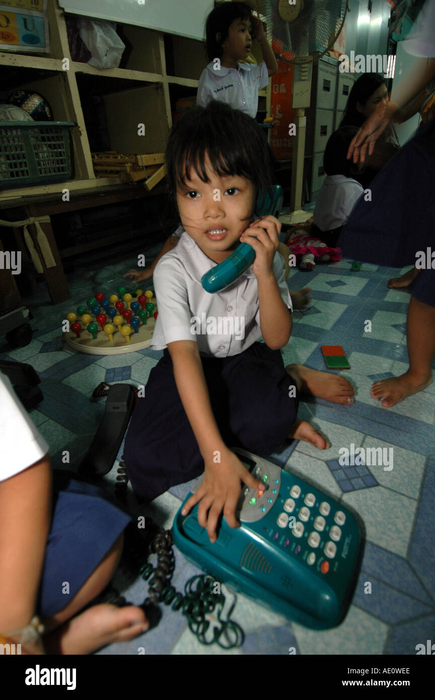 Infant school in the slums of Khlong Toey in Bangkok Thailand Stock Photo