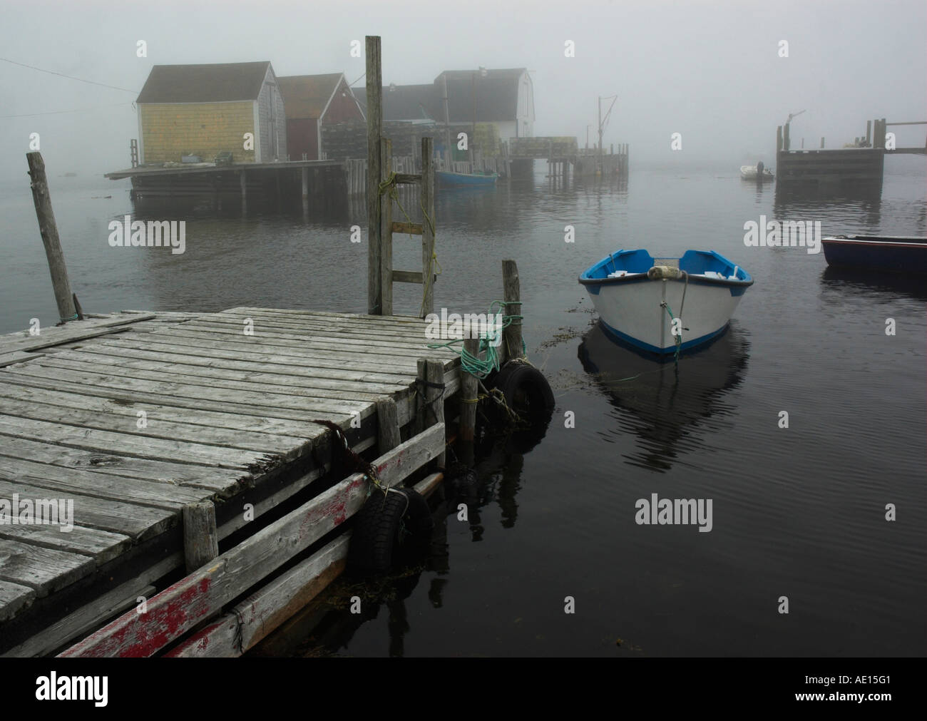 The tiny harbour of Blue Rocks near Halifax Nova Scotia in the fog ...