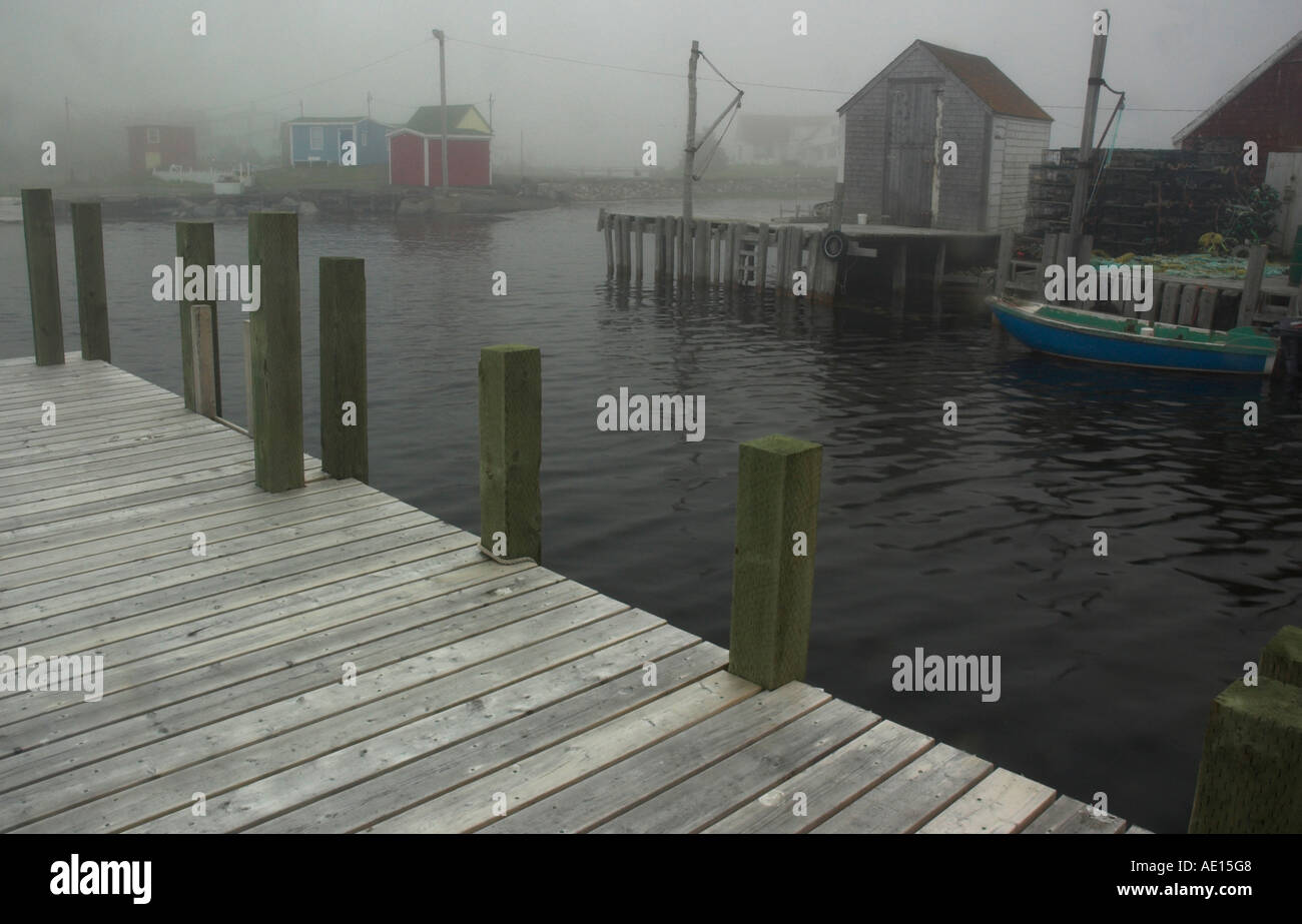 The tiny harbour of Blue Rocks near Halifax Nova Scotia in the fog ...