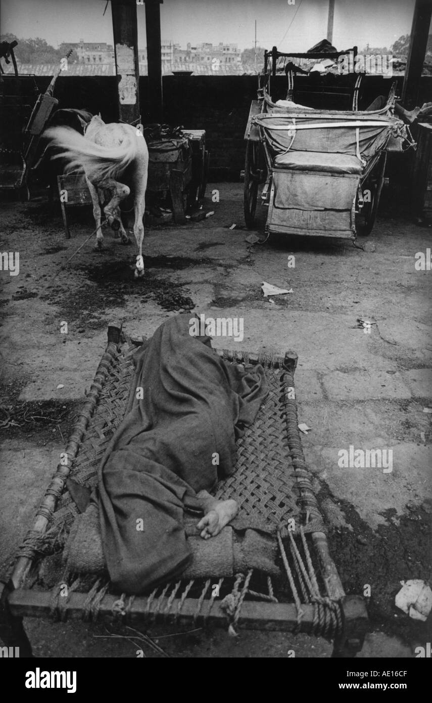 Man sleeping in cot in Black and White Stock Photos & Images Alamy