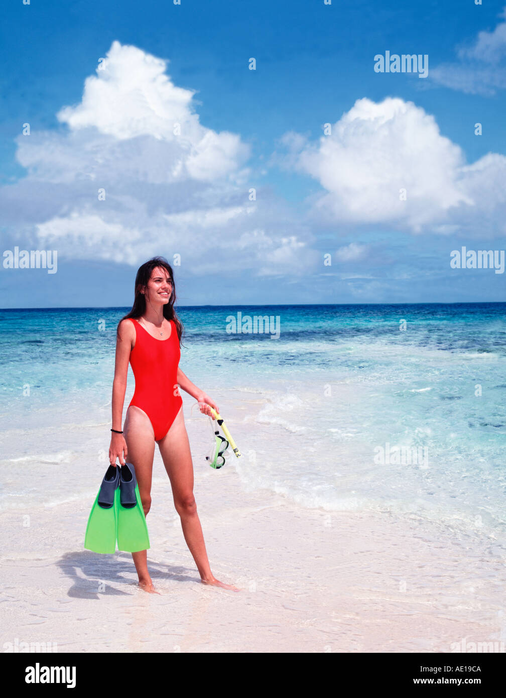 Young Australian aboriginal woman ready for snorkelling on Great Barrier Reef Queensland Australia Stock Photo