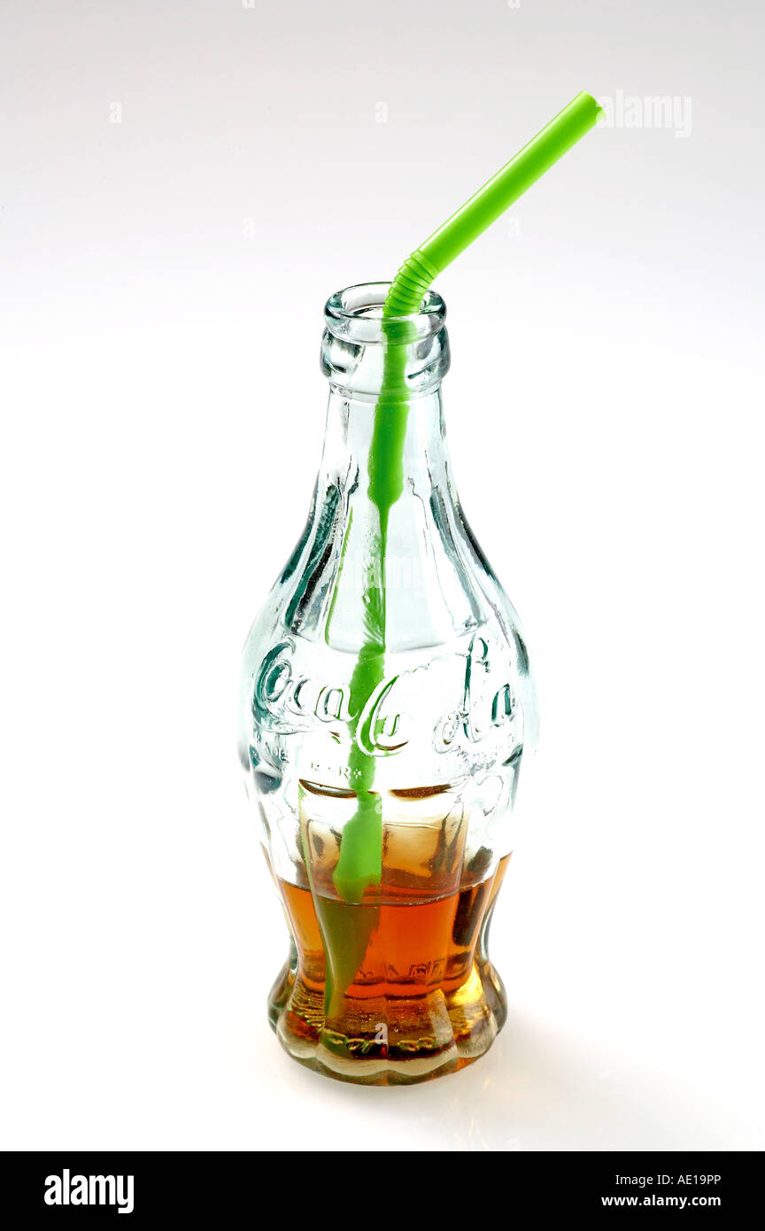 Coca cola bottle with a straw Stock Photo Alamy