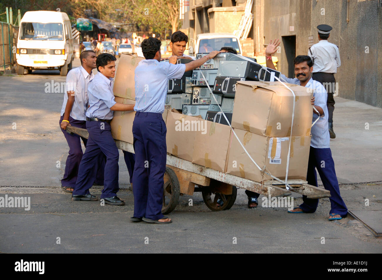 Indian workers transporting computer equipment in Mumbai / Bombay, India Stock Photo Alamy
