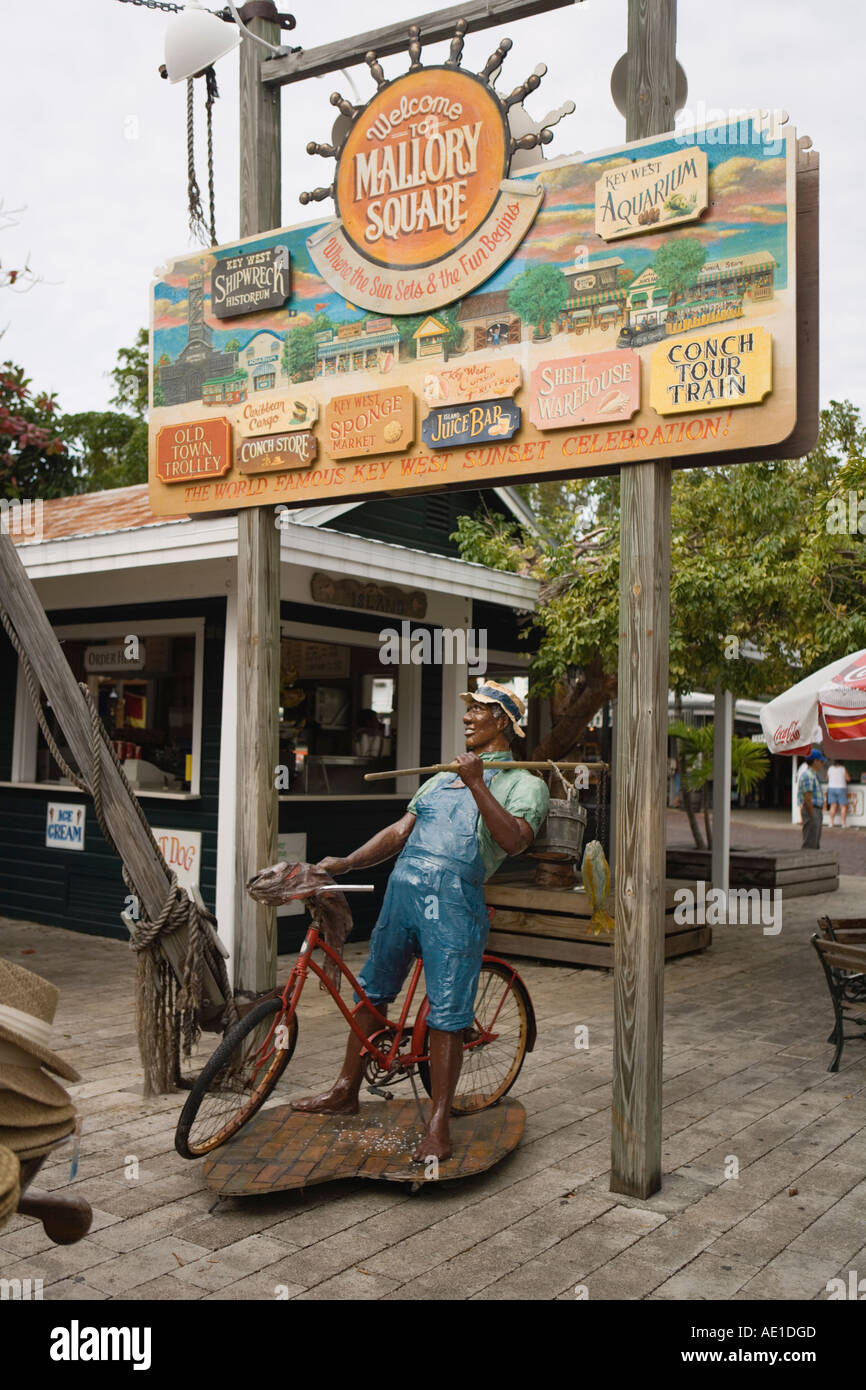 Entrance to Mallory Square Key West Florida with statue of man with