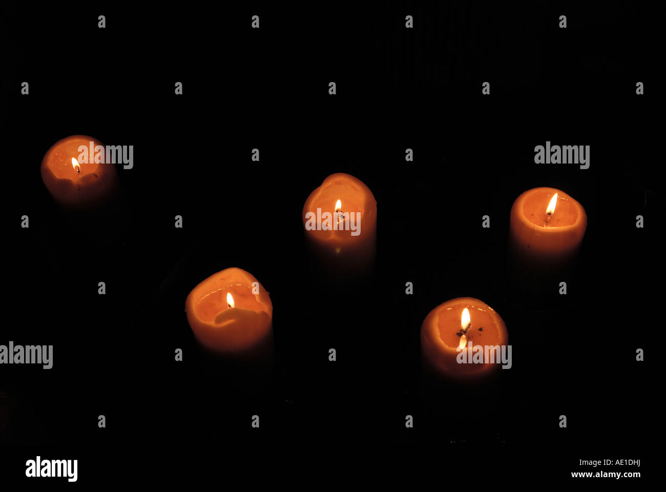 five red candles burning Stock Photo Alamy
