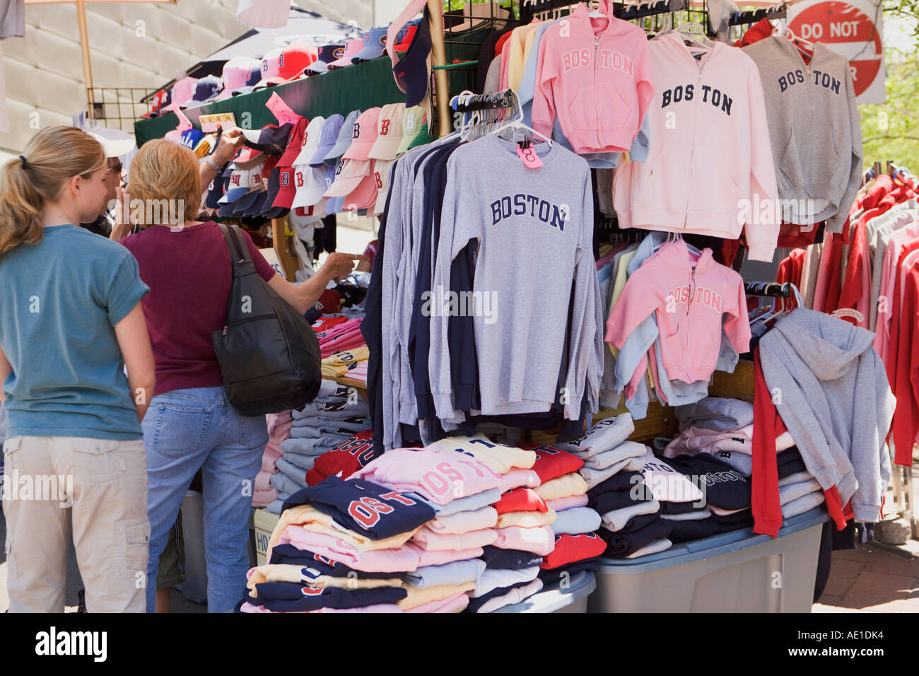 Shopping for Boston souvenirs at a kiosk outside the New England