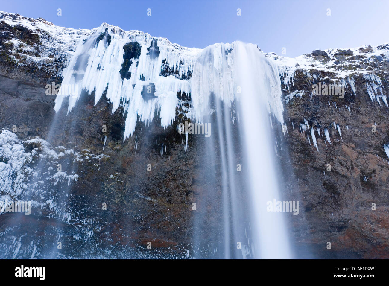 Iceland Seljalandfoss Falls waterfall and cliff Rangarvalla District Seljalandfoss Falls Stock Photo
